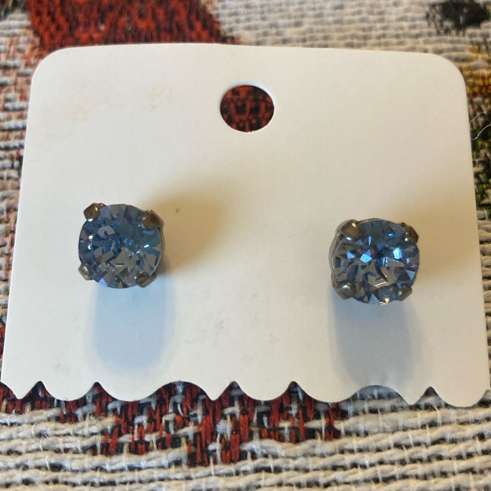 Crystal stud earrings in blue.
